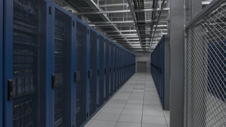 Cold-aisle view of a Korean data center with blue server rack doors, cable trays overhead, matte floor tiles, security cage mesh in background, no logos or readable text.