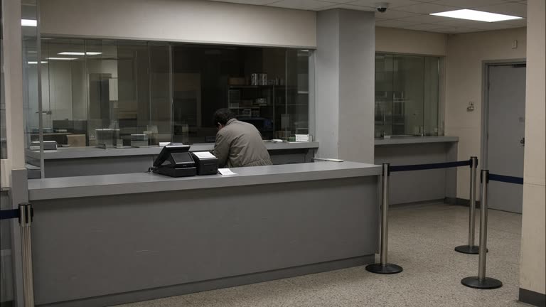 Indoor shopping-mall service counter with point redemption terminal and receipt printer under flat ceiling lights, muted decor and queue stanchions, no logos or readable text